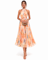 Dolores | Abito lungo fluido con scollo all'halter e stampa artistica